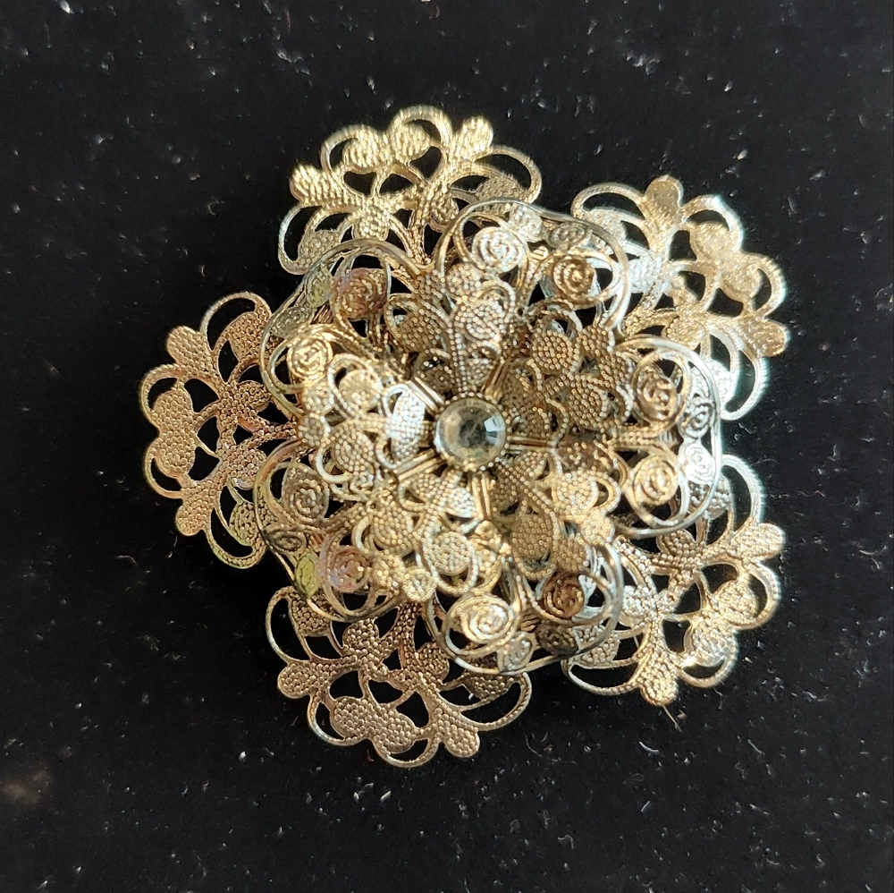 Vintage silver tone filigree brooch